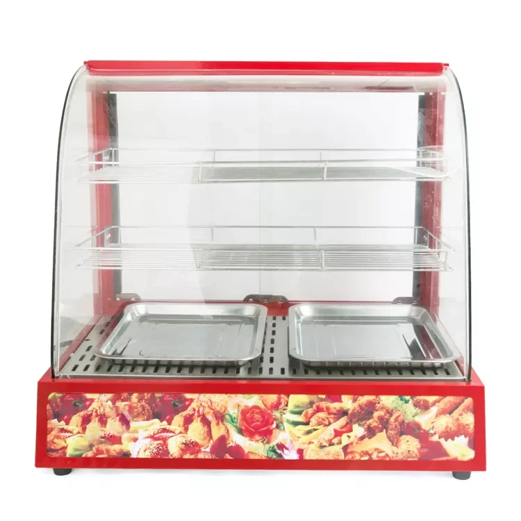 3-Tier Food Warmer Shelves with Food Close up of 3 tier food warmer shelves with chips sausages and pastries on display